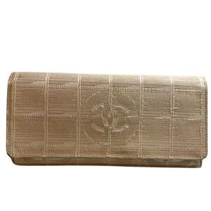 Chanel New Travel Line long wallet with COA and matching hologram.